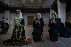 A Crimean Tatar bride getting married in traditional attire. The Crimean Tatars have resisted the Russian annexation and say that their community has been harassed and detained by the Russian authorities. Image by Denis Sinyakov/Al Jazeera.