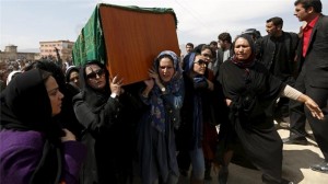 Afghan women carry body of lynched woman to burial. Source. 
