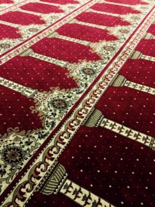 The carpet in the mosque there the author's family prays.